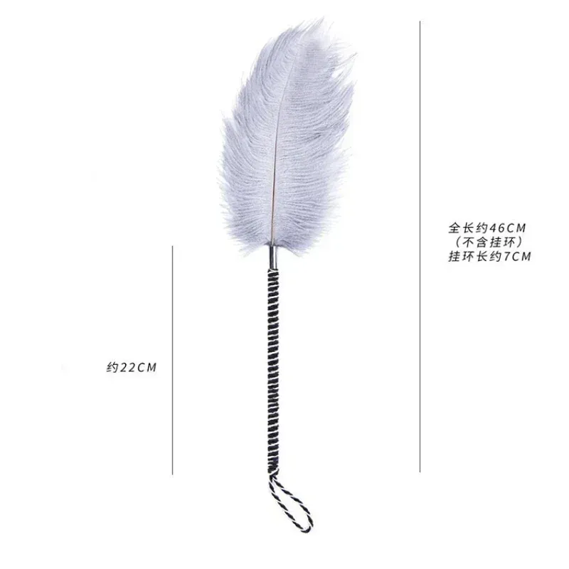 Látigo de plumas blancas para juegos sensoriales en pareja – Revisa la pluma